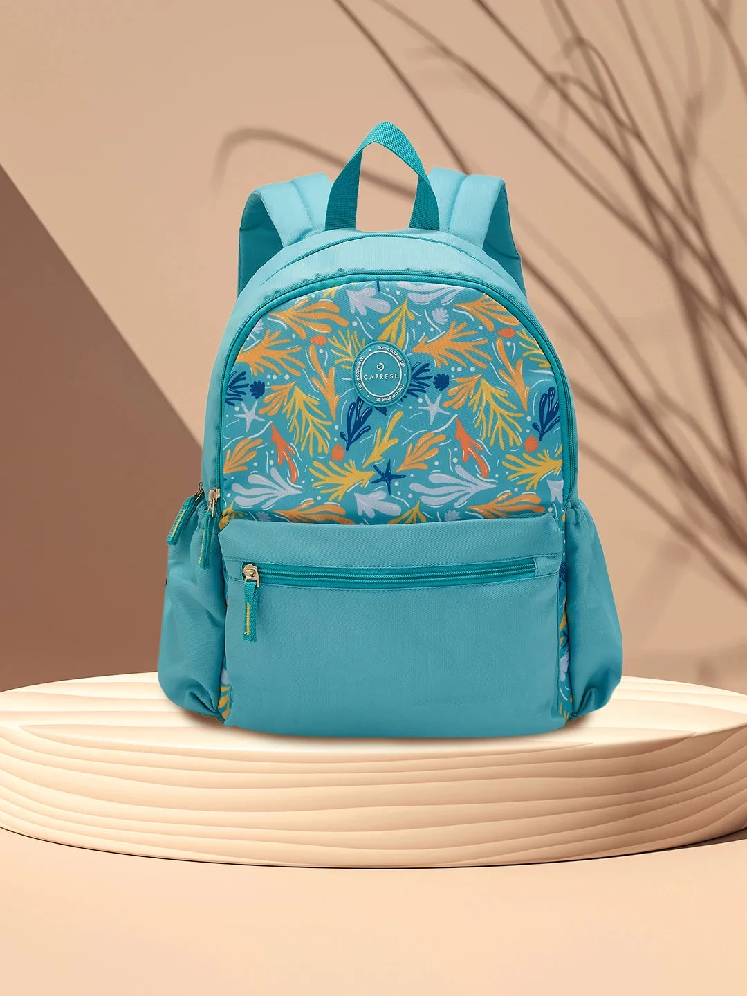 Caprese Xenia Backpack Medium Dual Compartment Turquoise Printed